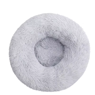 Light grey round plush donut bed viewed from above