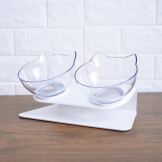 Transparent double cat-ear bowls on a white stand