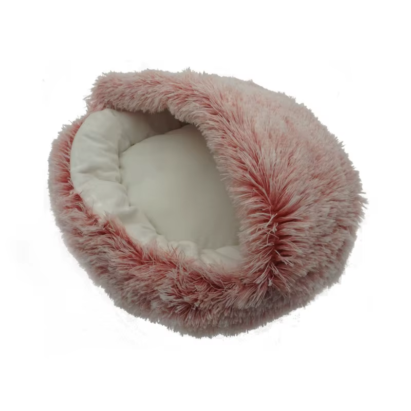 Pink hooded pet bed shown empty